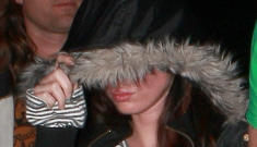 Megan Fox caught trying to hide suspiciously plumper lips