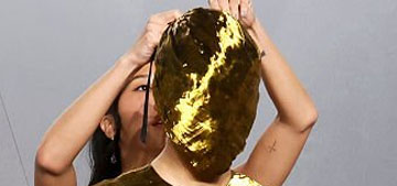 Audrey Nuna wore a dramatic, masked Maison Margiela dress to the VF Oscar party