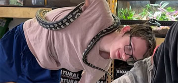 Portland reptile shop’s snake yoga classes feature multiple snakes & a tortoise