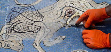 Italian bull mosaic gets delicate restoration after damage from heel-spinning ritual