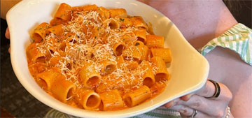 Insiders say Olive Garden uses Romano cheese because Parmesan is too expensive