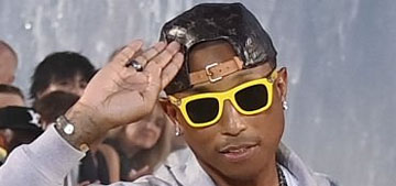 Louis Vuitton & Pharrell Williams under fire for giant waterfall catwalk during heatwave