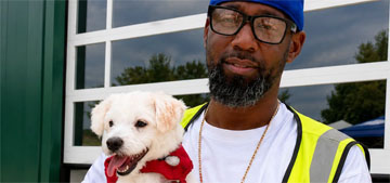 Waste management worker adopts dog someone threw in a dumpster